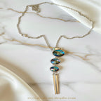 Collier Chaine Pendentif Métal perle vue  de face oblique retro